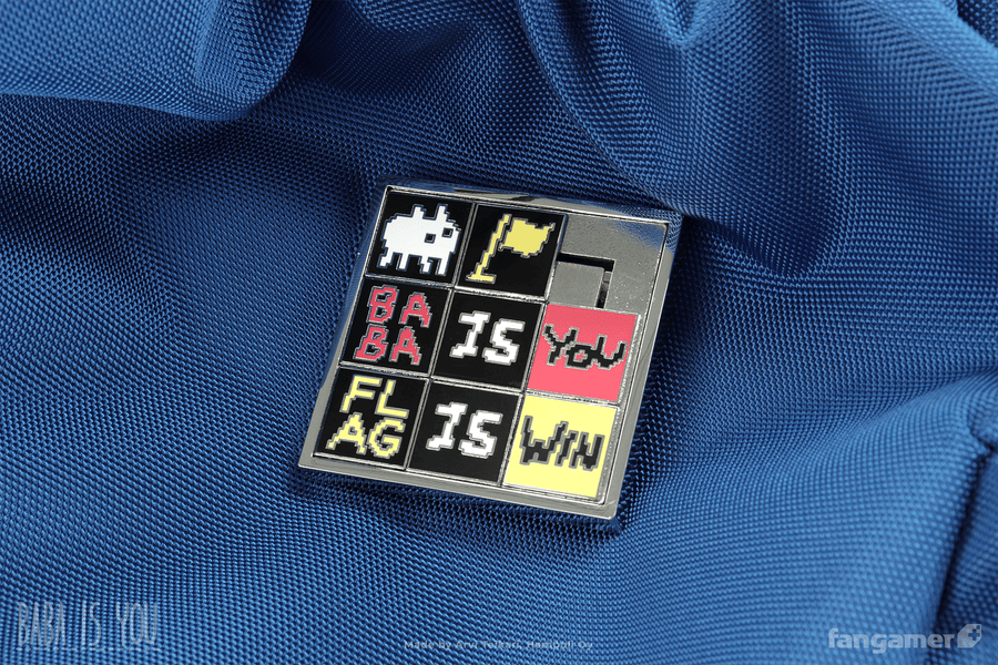 Baba Is Pin photographed against a ruffled backdrop of blue fabric.  - Baba Is Pin - Baba Is You